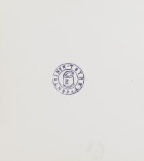 Jednokolorowy okrągły stempel na białym tle. Pieczątka składa się z uproszczonego rysunku jakby puszki lub kubła oraz w około tytułowego tekstu pisanego wielkimi literami