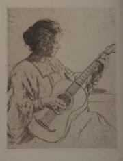 Kobieta grająca na gitarze